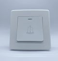 Modern White Doorbell Button with Bell Icon Royalty Free Stock Photo