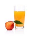 Close-up shot sliced orange nectarine with juice and leaf Royalty Free Stock Photo