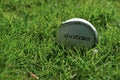 Close up shot of a sliotar on a grass pitch,used in the sport of hurling Royalty Free Stock Photo