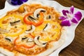 Close up shot of small pizza with mushrooms Royalty Free Stock Photo