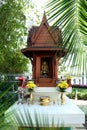 Close up shot of small temple model of buddhist spirit house in