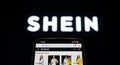 SHEIN Online Shop on Smartphone with Logo Display Royalty Free Stock Photo