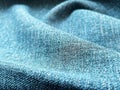 Close up shot of solid blue denim fabric with a soft and lightweight texture Royalty Free Stock Photo