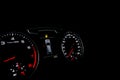 Close up shot of a speedometer in a car. Car dashboard. Dashboard details with indication lamps.Car instrument panel. Dashboard wi Royalty Free Stock Photo