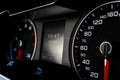 Close up shot of a speedometer in a car. Car dashboard. Dashboard details with indication lamps.Car instrument panel. Dashboard wi Royalty Free Stock Photo