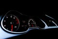 Close up shot of a speedometer in a car. Car dashboard. Dashboard details with indication lamps.Car instrument panel. Dashboard wi