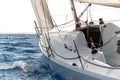 Close-up shot of a sport yacht sailing through the wind