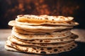A close-up shot of a stack of fresh pita bread, mediterranean food life style Authentic