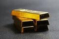 Close up shot of stacked 999.9 pure gold bar ingot on a black background Royalty Free Stock Photo