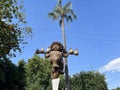 Close up shot of a statue holding chicken in Tlaquepaque