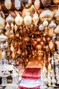 Close up shot of a store full of traditional metallic ornaments