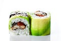 Close up shot Sushi roll with smoked eel and avocado on a white background