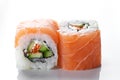 Close up shot Sushi rolls with salmon and caviar on a white background Royalty Free Stock Photo