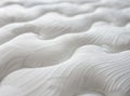 A close-up shot of the texture and pattern on a mattress, highlighting its softness and comfort for sleeping. The Royalty Free Stock Photo