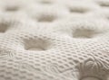 A close-up shot of the texture and pattern on a mattress, highlighting its softness and comfort for sleeping. The Royalty Free Stock Photo