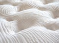 A close-up shot of the texture and pattern on a mattress, highlighting its softness and comfort for sleeping. The Royalty Free Stock Photo