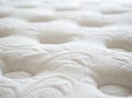 A close-up shot of the texture and pattern on a mattress, highlighting its softness and comfort for sleeping. The Royalty Free Stock Photo