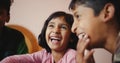 Close-up shot of three south Asian kids smiling