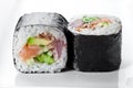 Close up shot of traditional fresh japanese sushi rolls on a white background