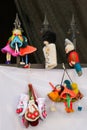 Close up shot of traditional hnadmade Georgian dolls in a blurry background