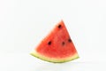 Close up shot of triangular ripe slice of watermelon isolated on white background Royalty Free Stock Photo