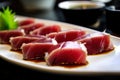 Close-up shot of tuna Sashimi with a soy sauce and wasabi dip Royalty Free Stock Photo