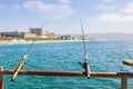 Close up shot of two fishing rod at Redondo Beach