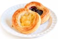 Apple Danish and Blueberry Danish on White Plate Royalty Free Stock Photo
