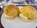 Close up shot of two Pineapple bun with butter