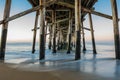 Close-up shot of the under part of a pier in Newport Beach, California Royalty Free Stock Photo