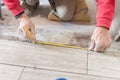 Close up shot of unfinished floor tiles installation in kitchen Royalty Free Stock Photo