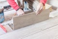 Close up shot of unfinished floor tiles installation in kitchen Royalty Free Stock Photo