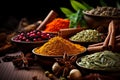 Close up shot of a variety of dry spices arranged on a kitchen table Royalty Free Stock Photo