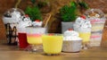 Close-up shot of various desserts on a wooden table