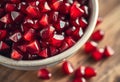 Vibrant Pomegranate Arils in a Bowl on Wood Royalty Free Stock Photo