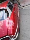 Close up shot of a vintage red car