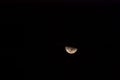 Close-up shot of the waning crescent moon with dark sky background. Moon photography Royalty Free Stock Photo
