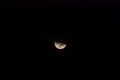 Close-up shot of the waning crescent moon with dark sky background. Moon photography Royalty Free Stock Photo