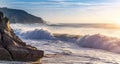 close up shot of waves hitting the coastline of portugal at the beach at calm orange sunset ocean. surreal selective focus shot Royalty Free Stock Photo