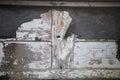 Weathered timber door with peeling paint Royalty Free Stock Photo