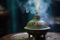close-up shot of well-used incense burner