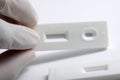 Close up shot of white rapid test cassette Royalty Free Stock Photo