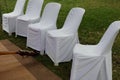 Close-up shot of white table and chairs, beautiful empty space decorated in a wedding Royalty Free Stock Photo