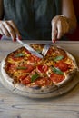 Close-up shot of woman eating delicious pizza Royalty Free Stock Photo