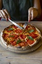 Close-up shot of woman eating delicious pizza Royalty Free Stock Photo