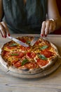 close-up shot of woman eating delicious pizza Royalty Free Stock Photo