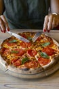 Close-up shot of woman eating delicious pizza Royalty Free Stock Photo