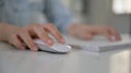 Close up shot Woman hand using mouse and computer keyboard Royalty Free Stock Photo