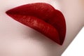 Close-up shot of woman lips with red lipstick. Beautiful perfect Royalty Free Stock Photo