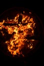 Close up shot of flames in the fire pit at night Royalty Free Stock Photo